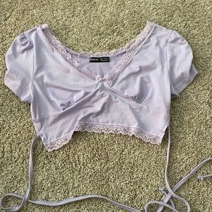 lavender lace crop top with strings to wrap around body from shein